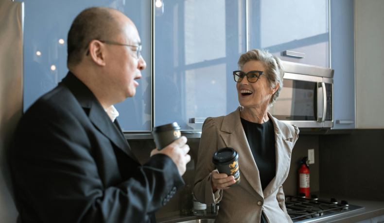 Business partners sharing a coffee