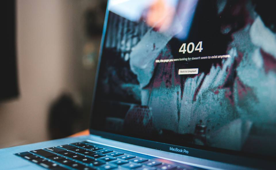 website on laptop with 404 error