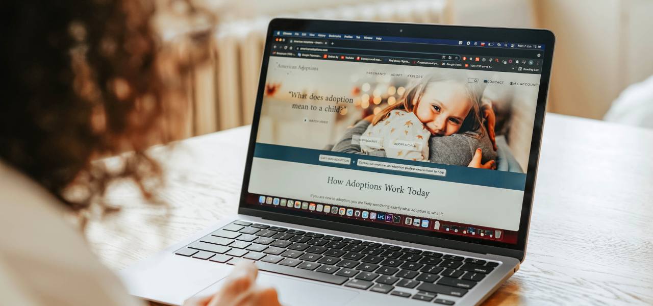 Website service page displayed on a laptop